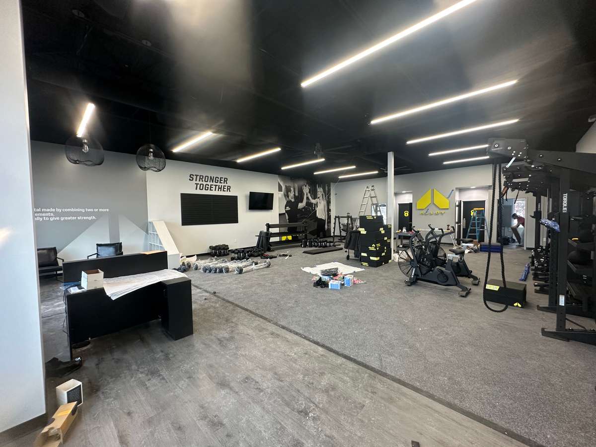 Alloy Fitness gym interior after painting