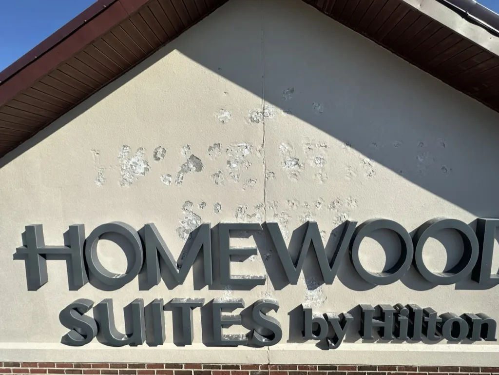 Homewood Suites siding before painting